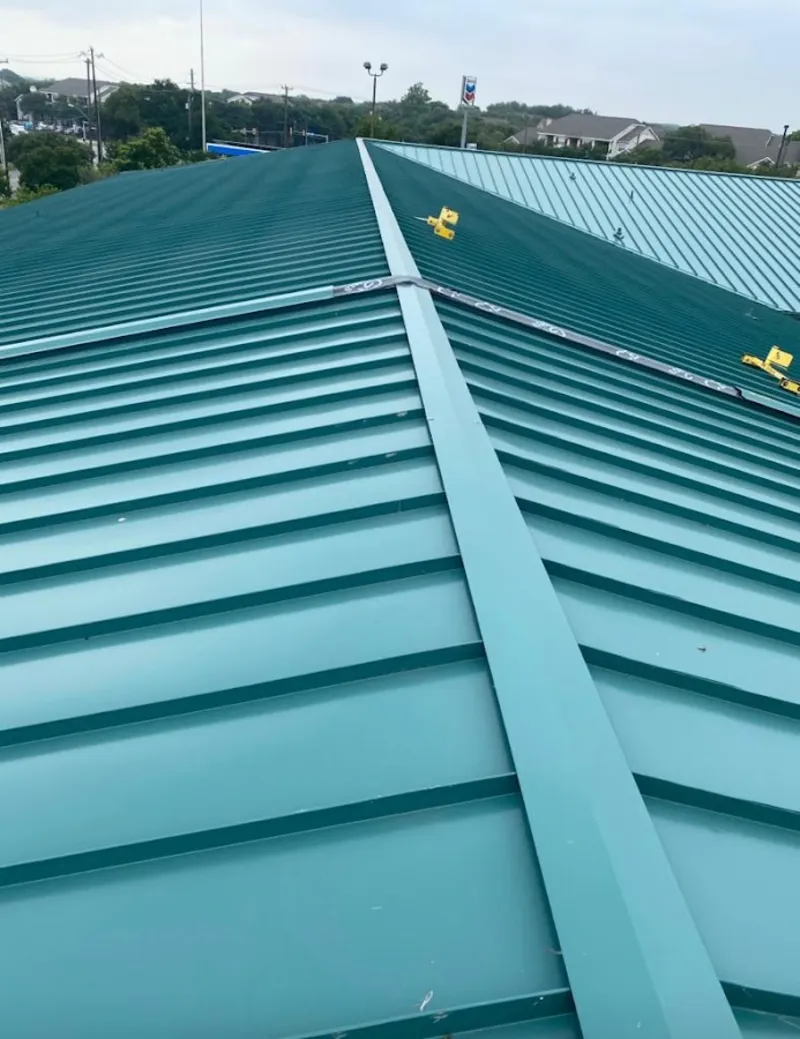 Green commercial metal roof ridge and valley for Metal Roof Repair in Portsmouth